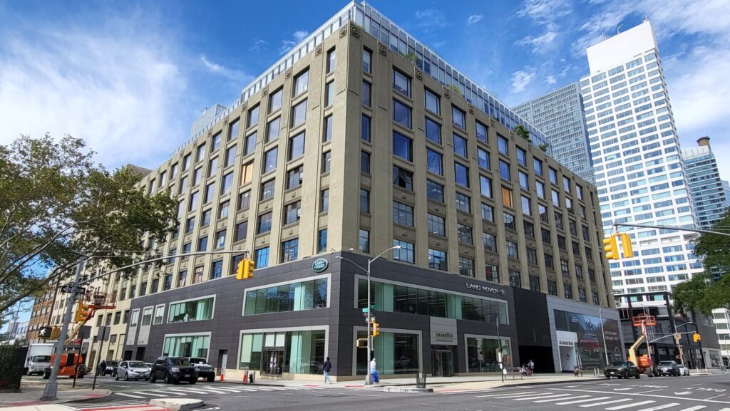 A large building with many windows on the outside.