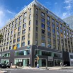 A large building with many windows on the outside.