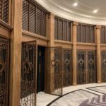 A large room with many doors and some stairs