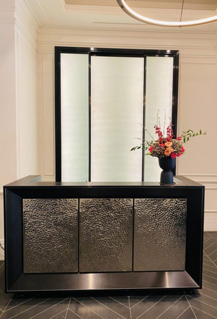 A vase of flowers sitting on top of a table.