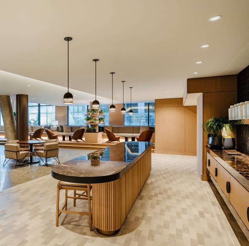 A large kitchen with wooden cabinets and island