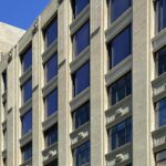 A building with many windows on the outside.